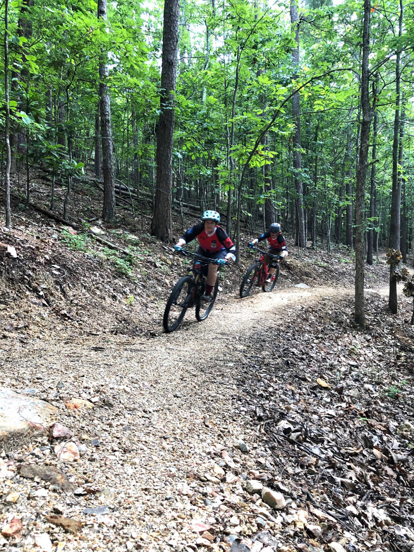 Two mountain bikers ride the Pullman Trail.