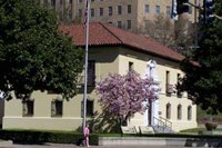 Adminstration building, taken from southwest corner from across the street. The saucer magnolia on that corner of the building is in bloom.