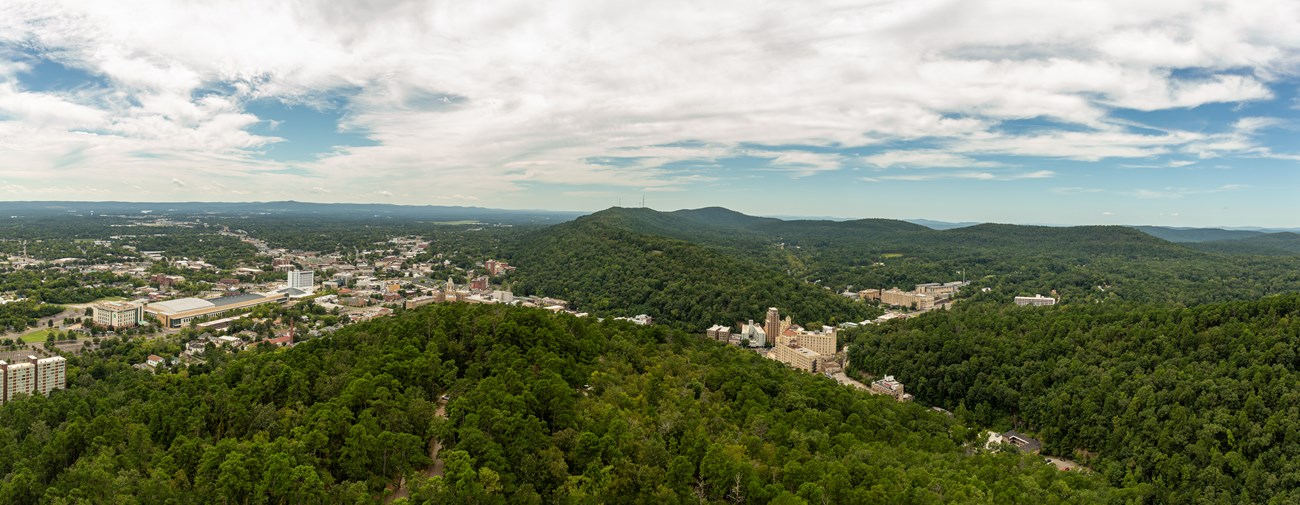 The city of Hot Springs and the surrounding Ouachita Mountains can be seen all together from the op of the mountain tower