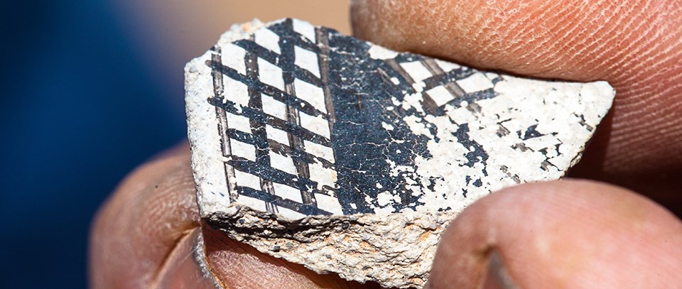a piece of black and white patterned pottery a piece of black and white patterned pottery