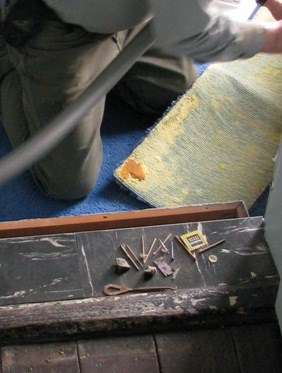 Artifacts found under step in second floor bathroom.