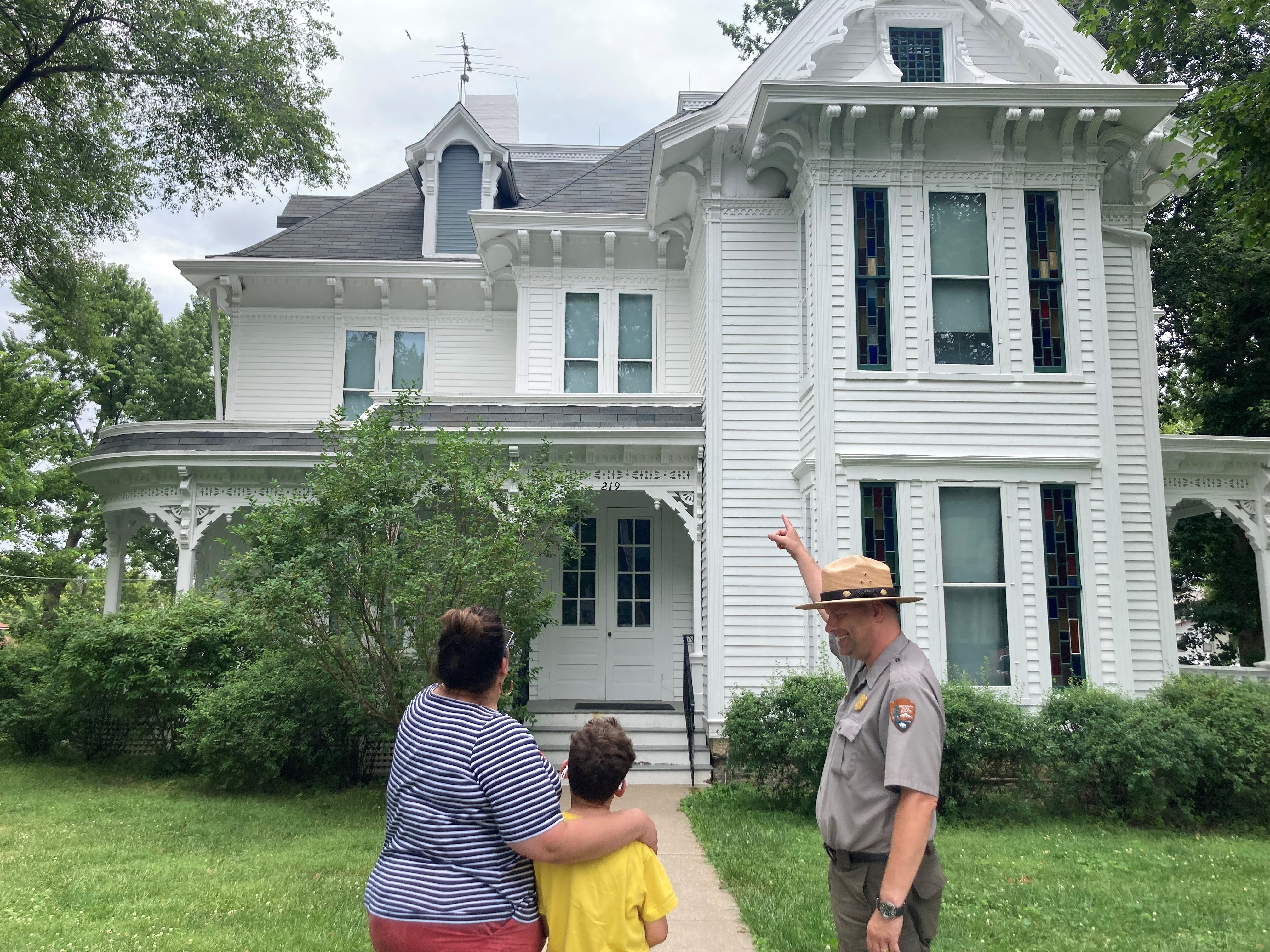 Park Rangers are back at 219 North Delaware Street! Park Ranger with visitors