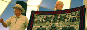 A Navajo rug being sold at auction. A Navajo rug being sold at auction.