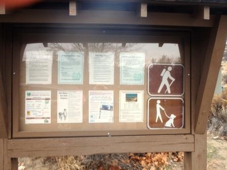 Informational sign with bulletins for visitors