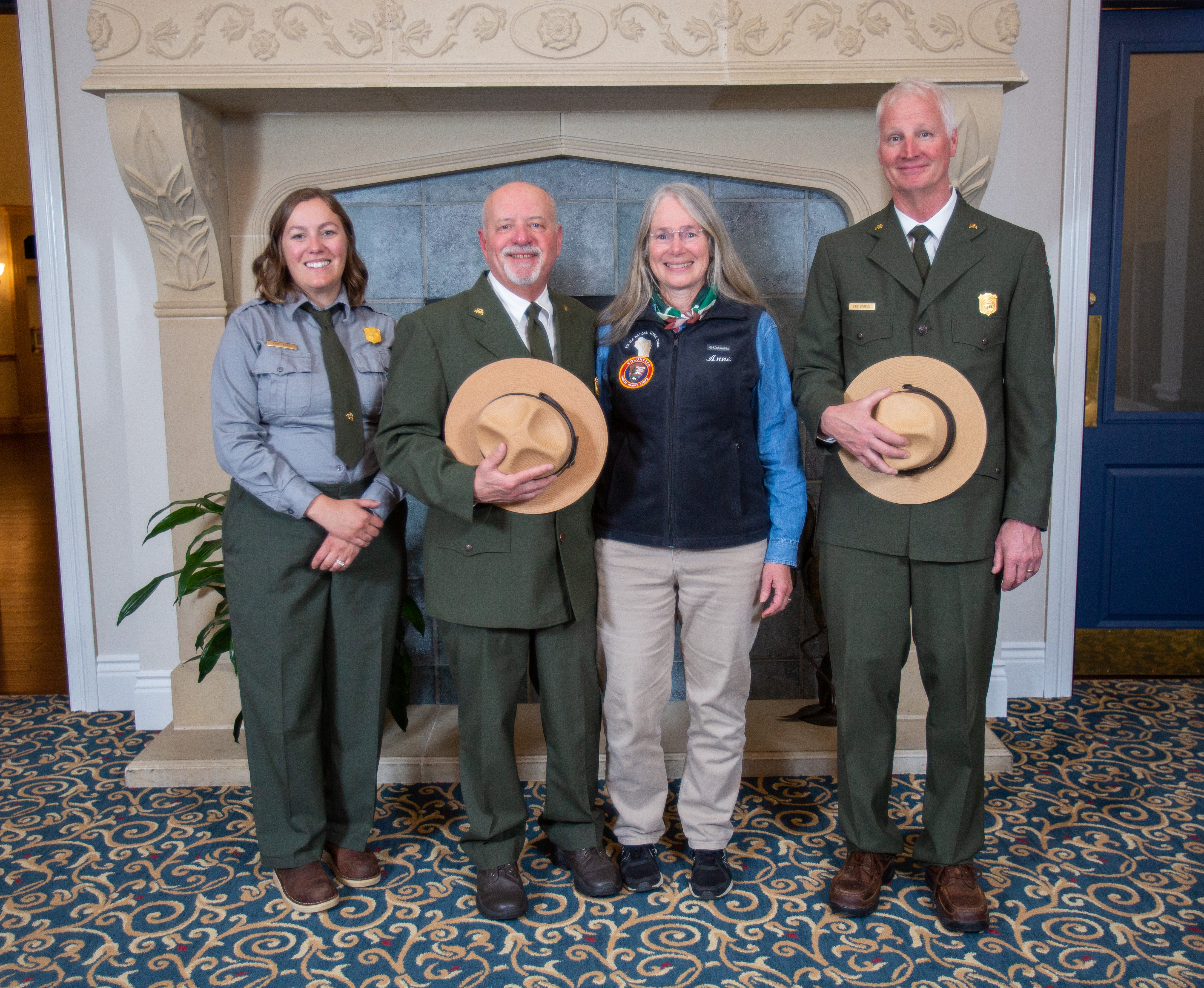 NPS Ice Age NST employees pictured with Anne Helsley- Marchbanks who accomplished 6000 hours of volunteer work.