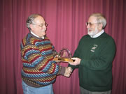 Photo: Corky Mayo received "Crystal Owl Award" from STMA superintendent Mike Watson
