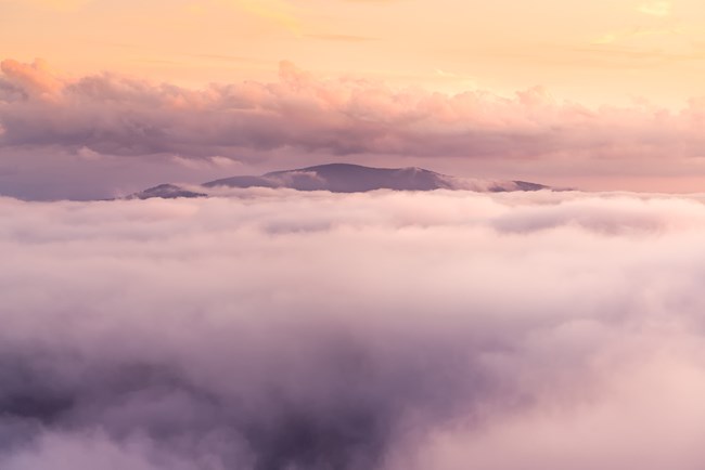 Leconte Vista. Sunset above the clouds. View of Leconte above the clouds.