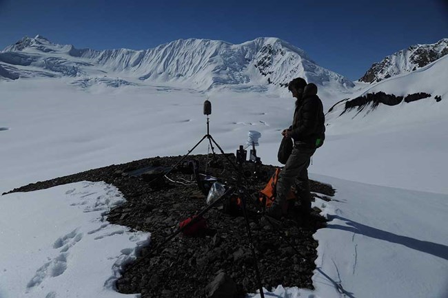Glacier soundscape A researcher records natural sounds on a Denali glacier.