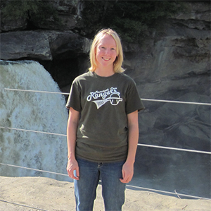 Clare Clare Bledsoe standing in front of waterfal