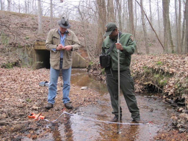 Cumberland Piedmont Network hydrologist Joe Meiman and natural resources specialist Marcus Johnson conduct stream discharge measurements at Shiloh National Military Park. Cumberland Piedmont Network hydrologist Joe Meiman and natural resources specialist Marcus Johnson conduct stream discharge measurements at Shiloh National Military Park.