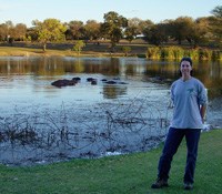 Sherry Leis Sherry Leis standing in a scenic landscape