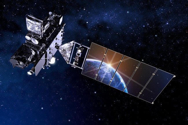 Earth reflected in satellite panel