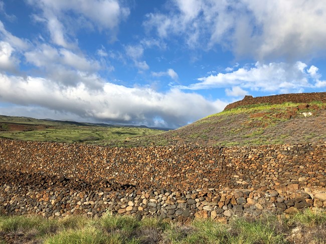 Puʻukoholā Heiau Landscape Remnants of a centuries-old wall at Puʻukoholā Heiau National Historic Site