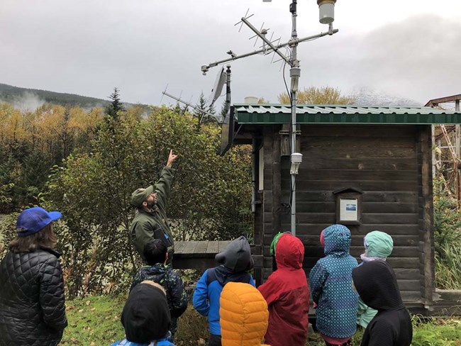 Andy_KLGO_web A group of kids learn about weather stations.