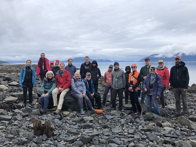 IGS_glacierbay_web A group of people gather on a northern beach.