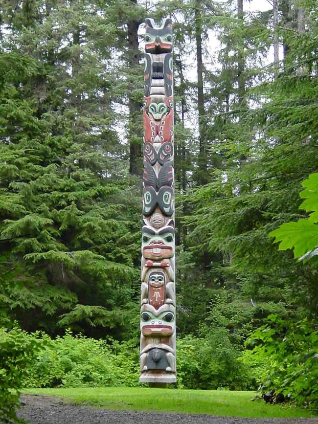 A totem pole in Sitka national Historical Park.