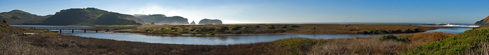Panorama of Rodeo Lagoon and Beach on a bright, clear day.