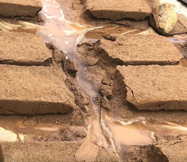 Melted bricks Adobe bricks, melted in the rain