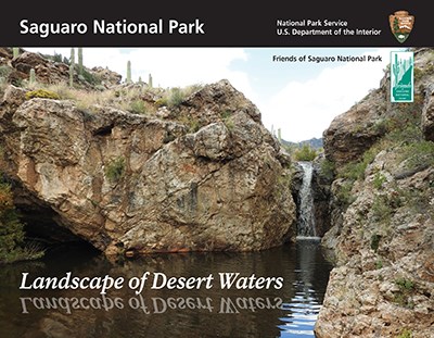 Book cover with black bar, logos for NPS and Friends of Saguaro, and photo of grotto with waterfall. Title is Landscape of Desert Waters.