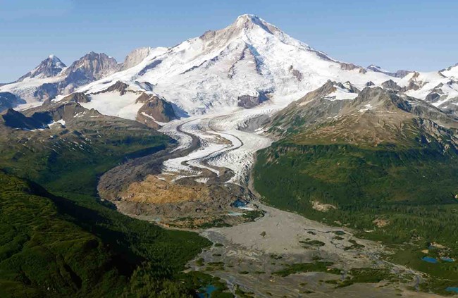 A glacier flows out of Iliamna Volcano in Lake Clark.