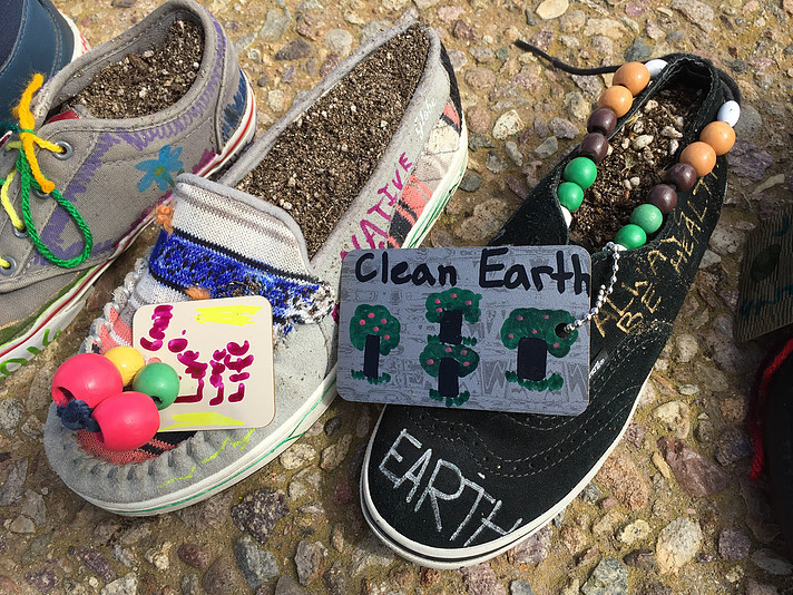 Photo of shoes that have been decorated learning about climate change