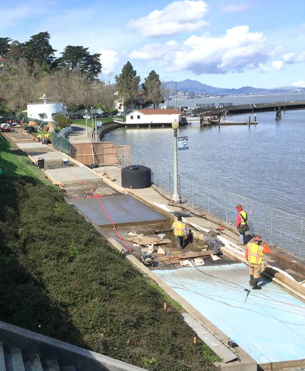 Pouring Concrete Slabs on Promenade Concrete slabs poured and drying during the promenade construction project.