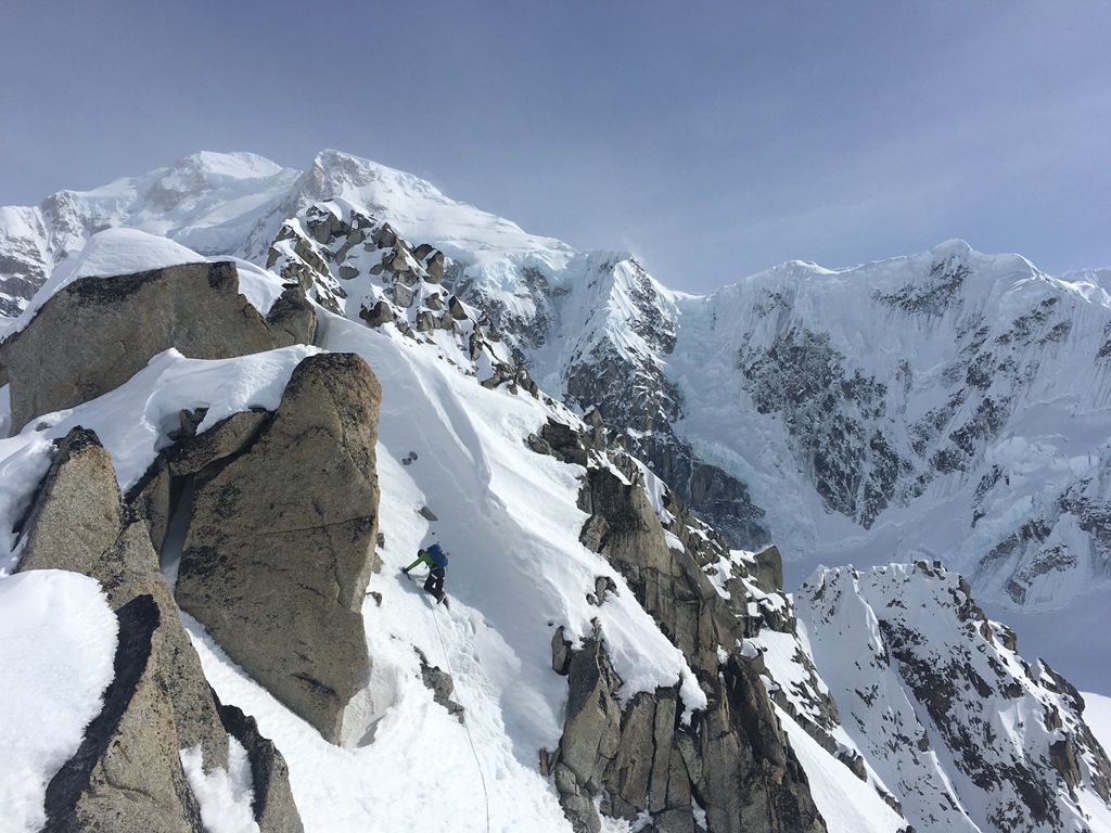 Ranger Dave Weber ascends Annie's Ridge A roped mountaineer climbs a steep ridge