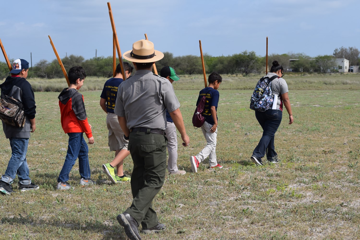 Students are doing infantry drills with wooden muskets