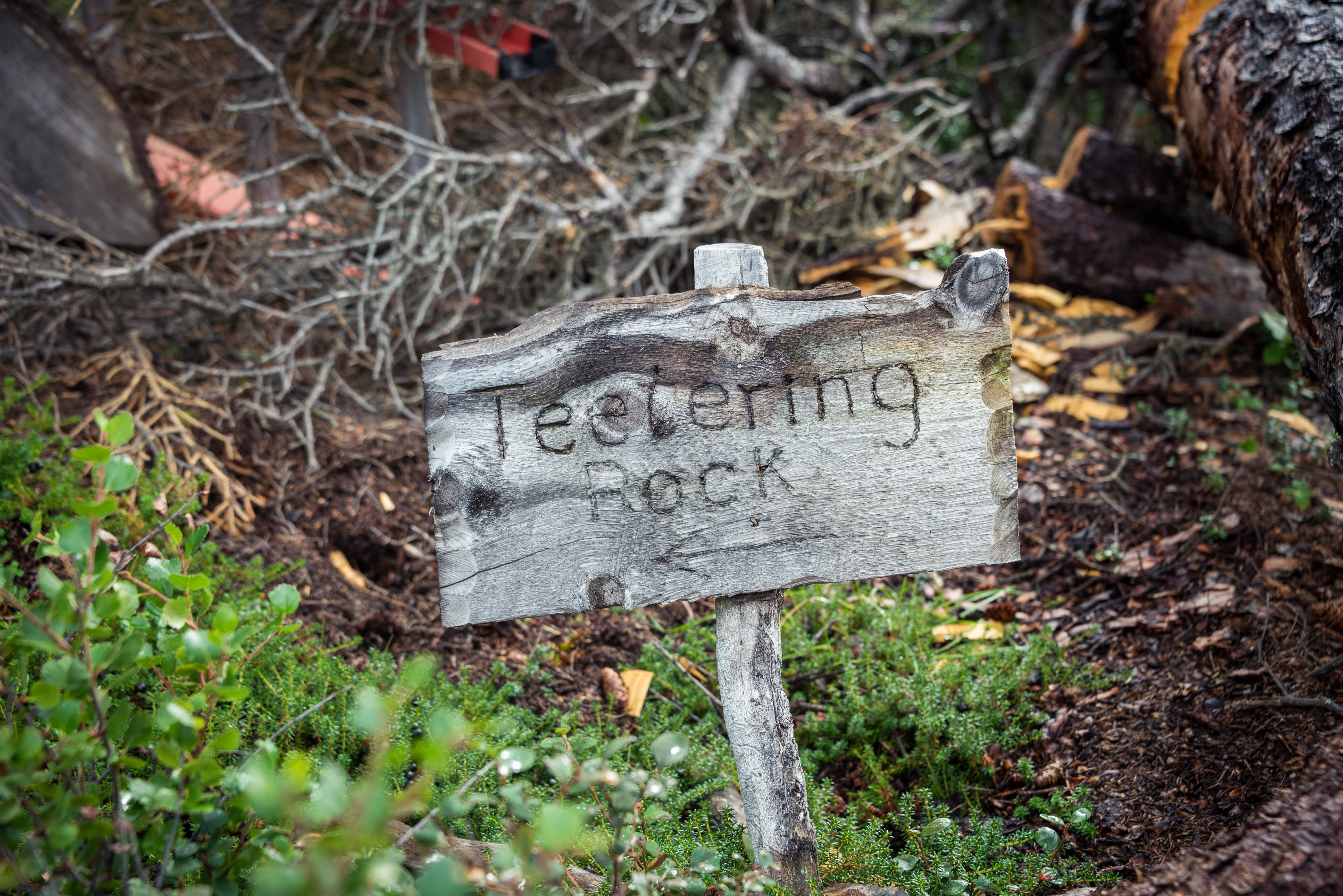 a wooden sign that says