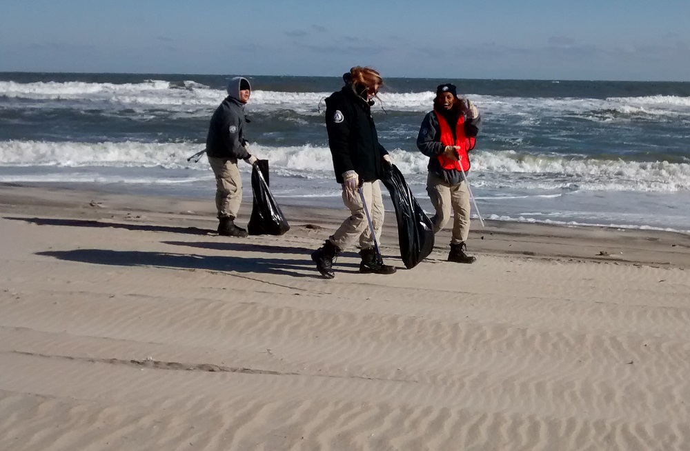AmeriCorps NCCC crew during beach cleanup AmeriCorps NCCC crew during beach cleanup