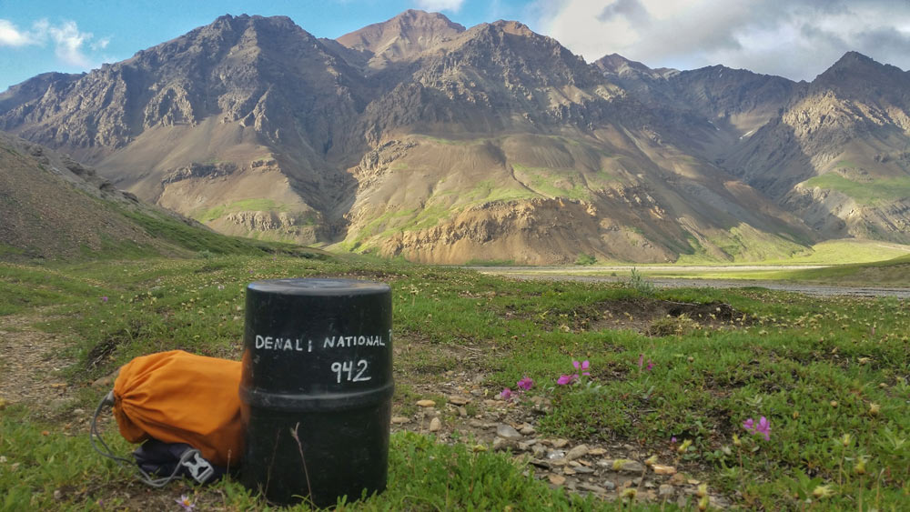 BRFC a black plastic canister sitting on a hilltop