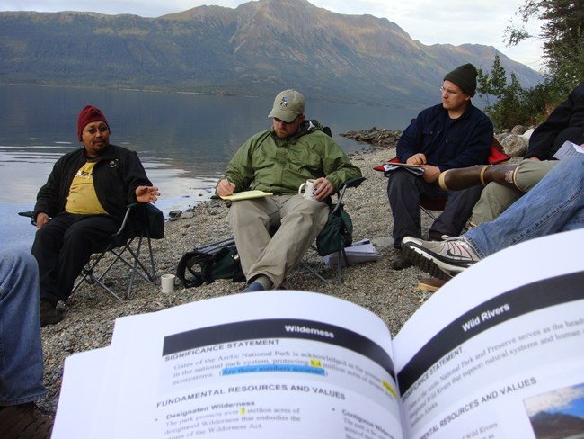 Park staff discuss planning considerations in the Gates of the Arctic Wilderness.