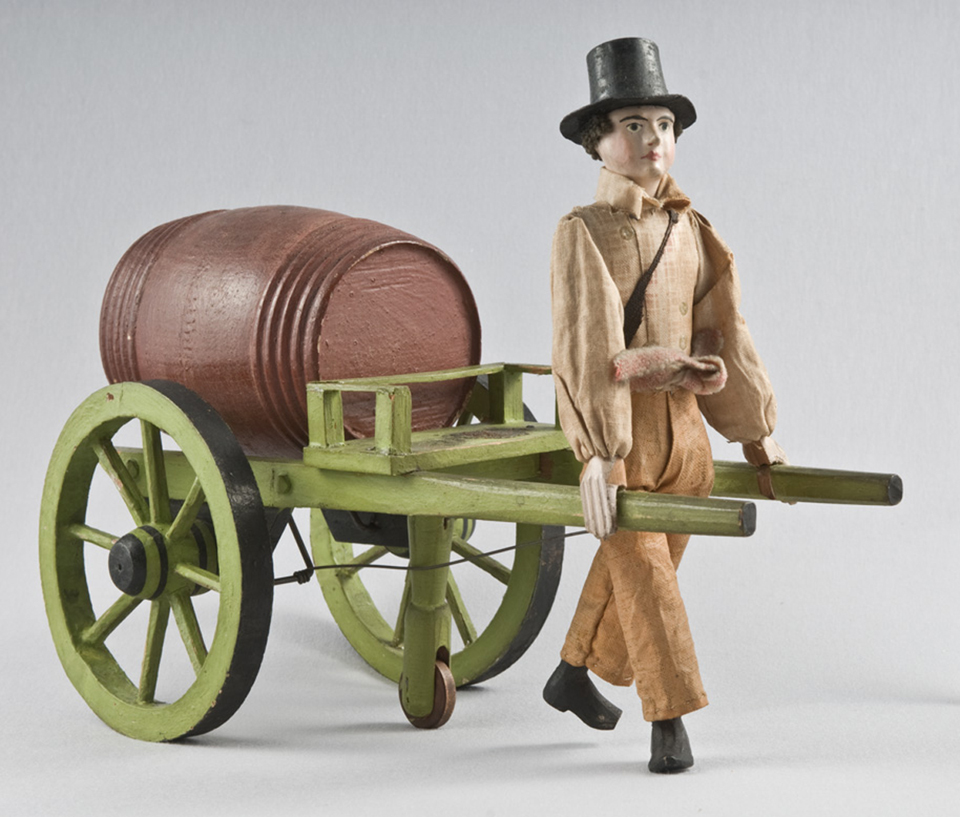 A mid-19th century cart toy with moving parts that belonged to Ernest Longfellow. A mid-19th century cart toy with moving parts that belonged to Ernest Longfellow.