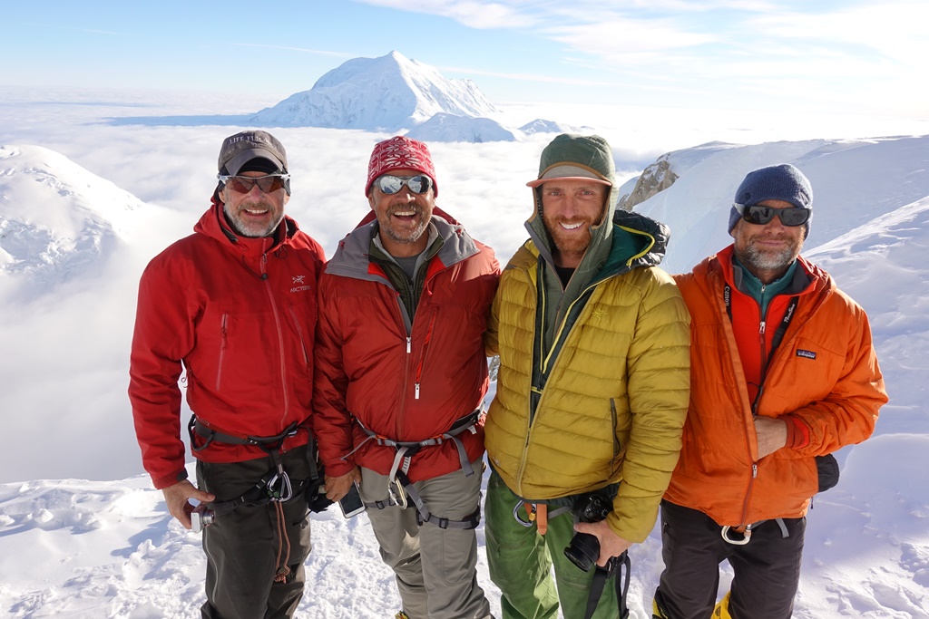 Four NPS Volunteers stand at the 'Edge of the World'