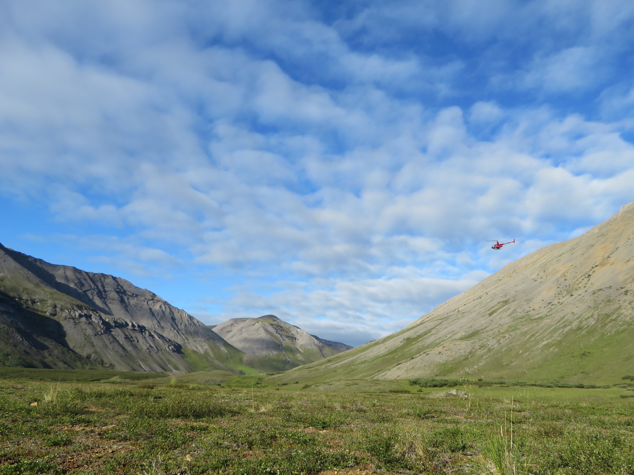 Helicopter in Noatak National Preserve takes crew to a likely landform for archaeological survey.