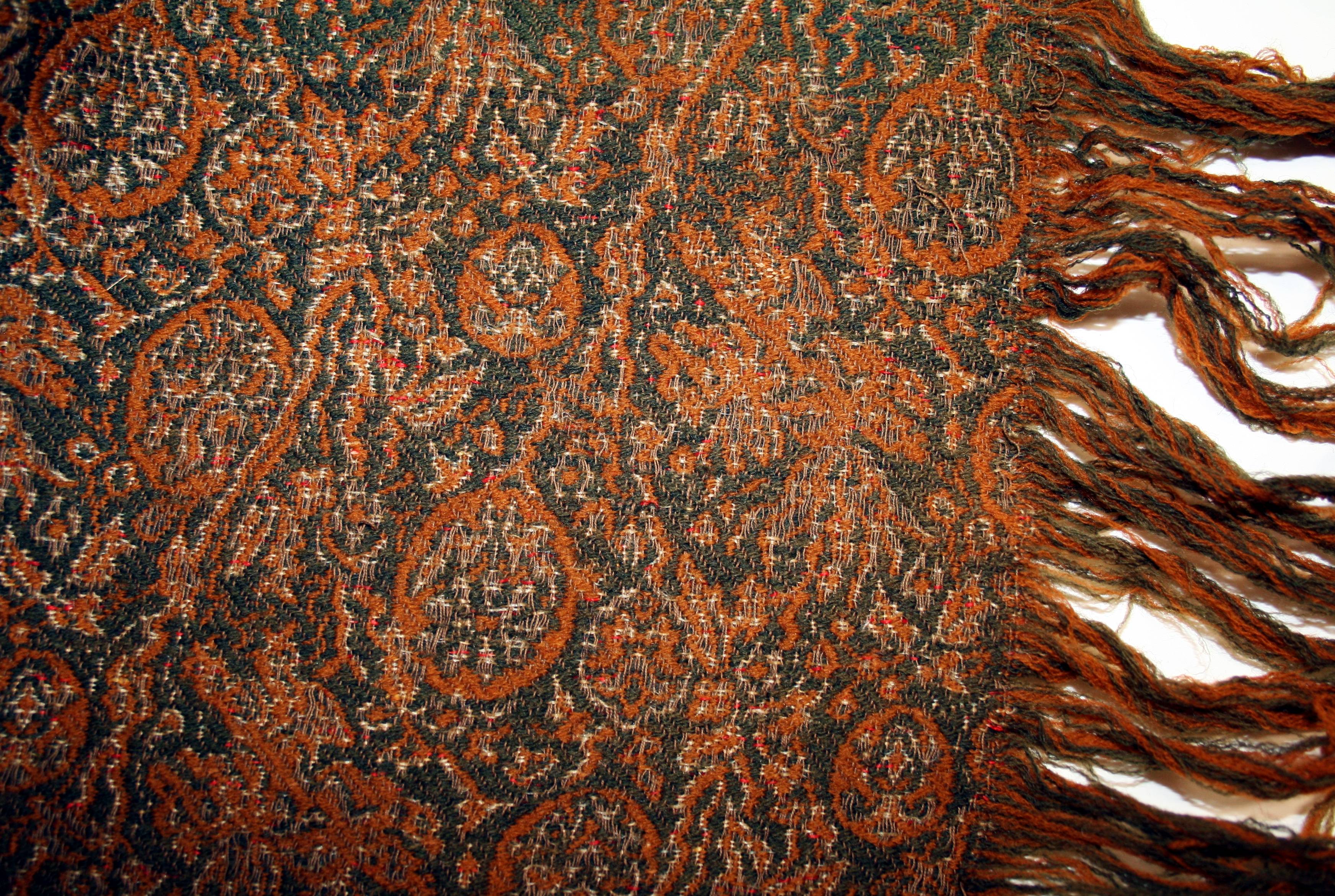 paisley shawl close up close up photo of the pattern in the paisley shawl