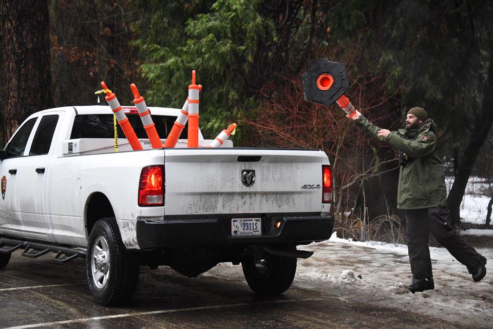 Park rangers collect traffic cones
