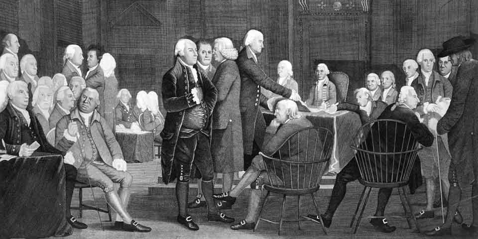 Black and white image of the Pine-Savage print, Congress Voting Independence, with many men in 18th century clothing standing together in one room.
