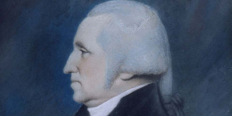 Color image of a detail of a pastel on paper of George Washington. Washington is in left profile with powdered hair tied in a queue with a gray ribbon. Color image of a detail of a pastel on paper of George Washington. Washington is in left profile with powdered hair tied in a queue with a gray ribbon.