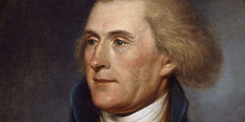 Color image of a detail of a painting of Thomas Jefferson, focusing on Jefferson's face. He has auburn hair and blue eyes. Color image of a detail of a painting of Thomas Jefferson, focusing on Jefferson's face. He has auburn hair and blue eyes.