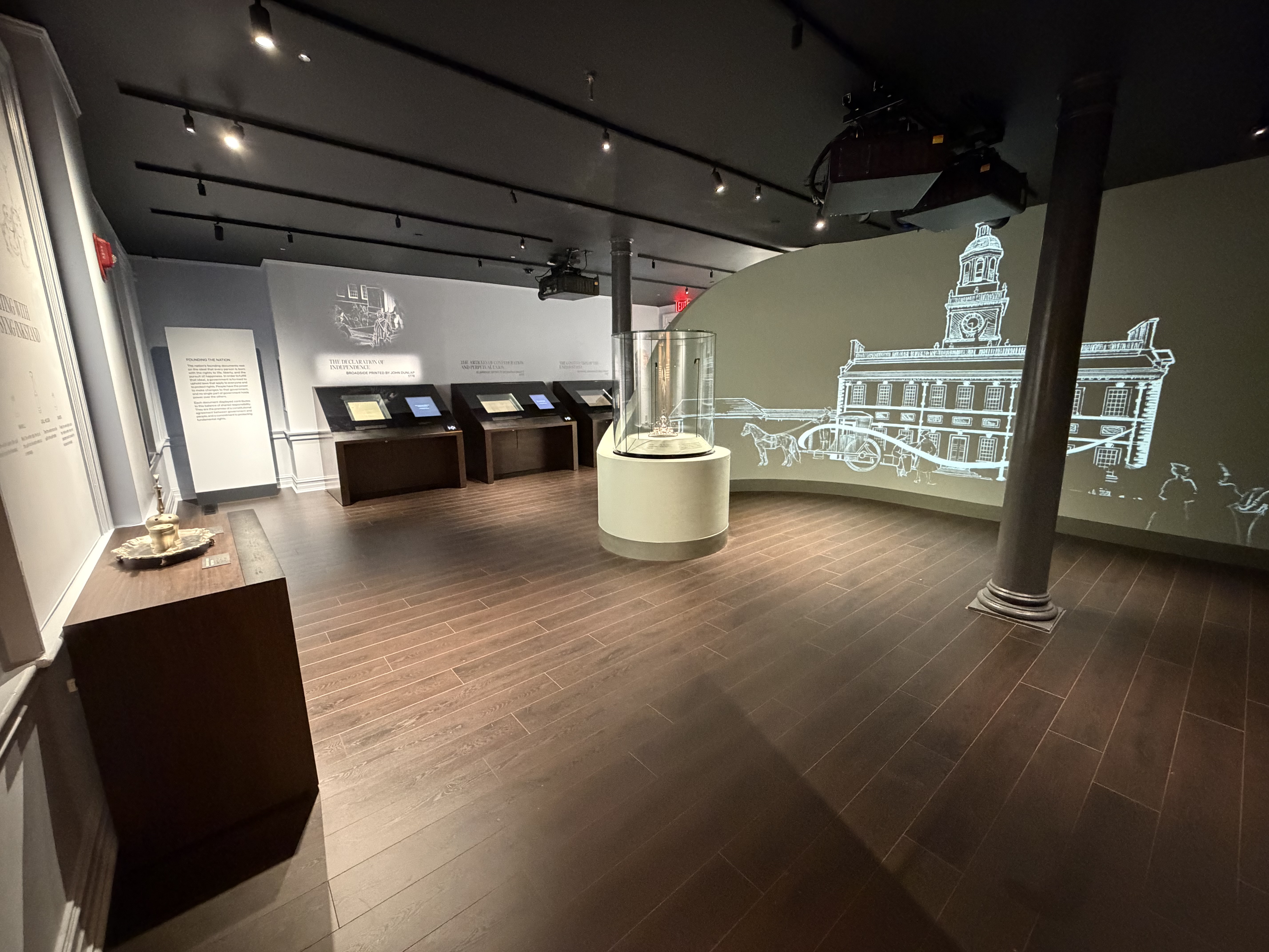 Interior of exhibit room with an inkstand in a vitrine case.
