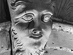 Detail of carved wooden mask on tabernacle frame in the central hall of Independence Hall.