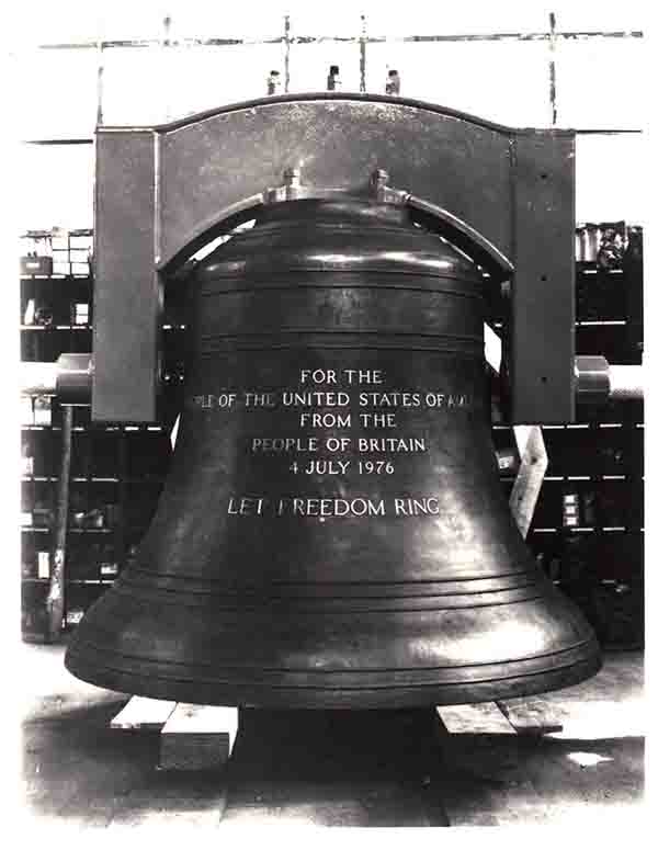 Bicentennial Bell - Gift From The People Of Britain A black and white image of a large bell with dedication text "FOR THE PEOPLE OF THE UNITED STATES OF AMERICA FROM THE PEOPLE OF GREAT BRITAIN JULY 4, 1976 LET FREEDOM RING"