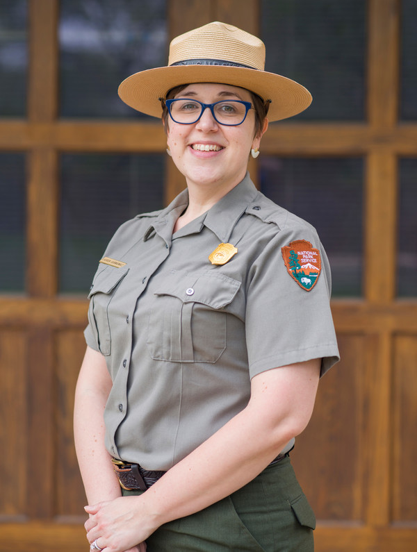 Lauren Gurniewicz by Tarpley A smiling woman in a National Park Service uniform