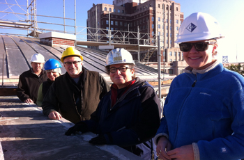 INDE historical architect Charles Tonetti with construction team members