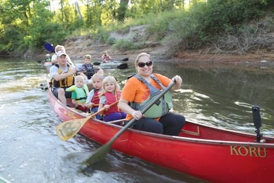 Family paddling in kayak
