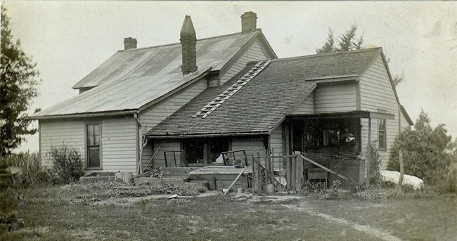 Lone Oak Farm Historic photograph of an old Indiana farm house in the early 1900s.