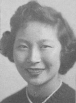 Undated black and white portrait of a mid-century woman with dark hair.