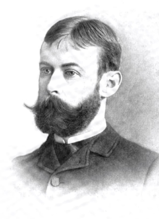 Portrait of a bearded man with dark hair and a large mustache; wearing a dark suit