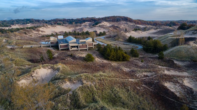 West Beach Bath House aerial Aerial photograph of West Beach Bath House, a cement, one-storied, modular structure with clerestories on the roof.